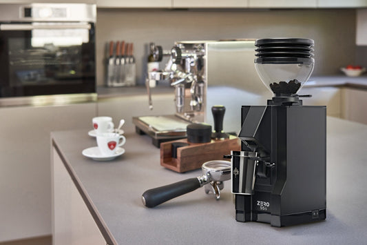 Espresso grinder and machine on a home kitchen counter
